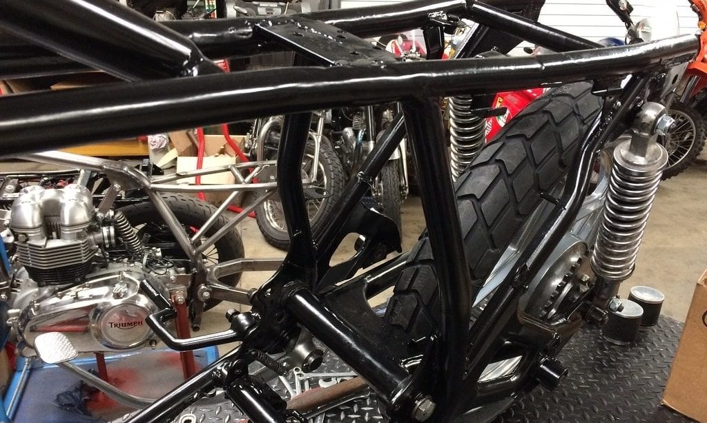 Powder coating over bike frame